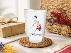 Gold rim shot glass featuring Philippine map and flag