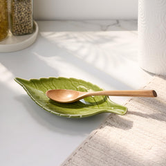 Green ceramic spoon rest leaf motif for stove top