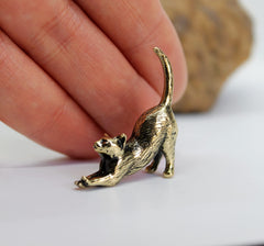 Hand-Casted brass stretching cat sculpture for shelves