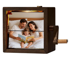 Hand crank photo album with mechanical frame close up