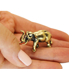 Brass elephant statuette weighs 22.5 g