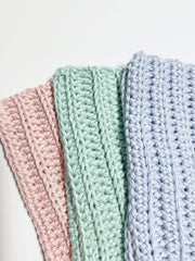 Close up blue handmade crochet washcloths 3-pack
