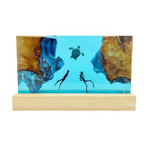 Handmade Ocean Resin Lamp with turtle and diver figures illuminated