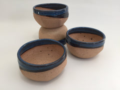 Textured unglazed sides provide grip on shave bowl