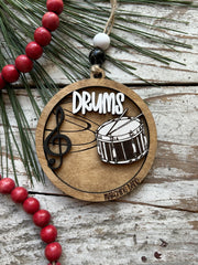 includes two wood beads and twine for hanging
