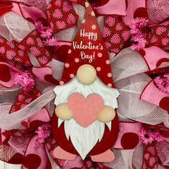 Close up of Happy Valentine's Day Gnome hat and heart ribbons