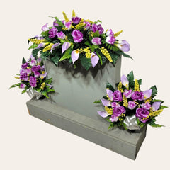 Cone arrangement front view with grave flowers and back greenery