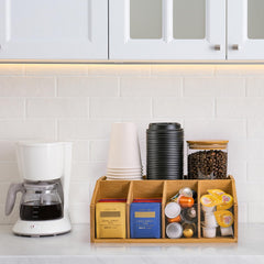 Clear acrylic divider inside coffee station organizer