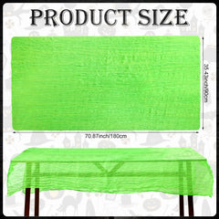 Green gauze tablecloth used as trunk or treat decor