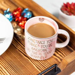 Ergonomic handle ceramic mug with pink marble texture and gold lip