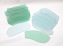 Blank sea glass place cards with flat surfaces and frosted surfaces