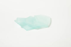 Machine tumbled sea glass with frosted surfaces