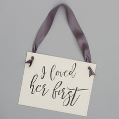 Hand tied satin ribbon around sign about 28 inches