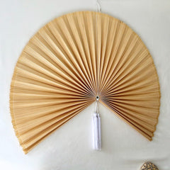 Japanese style folding fan wall art with green hues