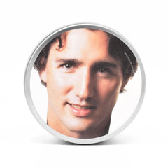 Tin lid shows Trudeau face on maple scented candle