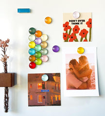 Rainbow set of KEYDUACU magnets on a magnetic board