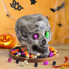 Plastic miniature skull heads prank props for Halloween and April Fools