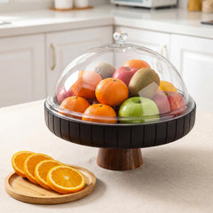 Wooden fruit bowl with lid on countertop close up