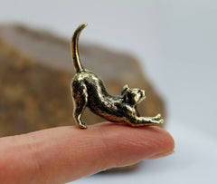 Cat lovers gift brass figurine on bookshelf