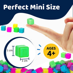 Komarc Games StickiKubes packaging with neon cubes