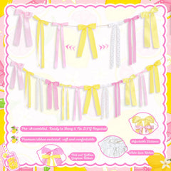 Lace accented bow on garland with soft white trim