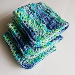 Handmade crochet square cotton dishcloths in light green and blue hues