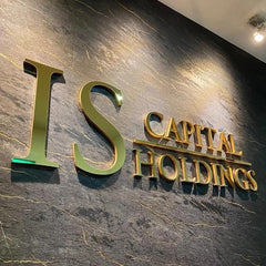 Brushed gold finish metal logo sign
