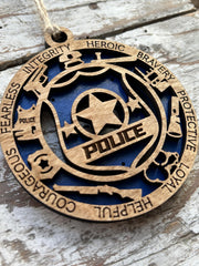 Law Enforcement Christmas Ornament hanging on a tree