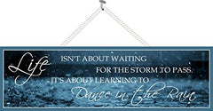 Life Isn’t About Waiting for the Storm Inspirational Quote Sign with Rain Scene wall sign 16x5x3/8 inches Made in USA