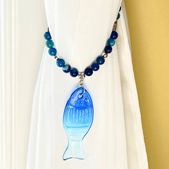 Two matching tie backs with blue agate beads and starfish charms