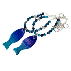 Beaded strand featuring blue agate beads on a durable chain