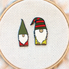 Magnetic enamel needle minder featuring gnome design