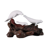 Manatee Family Sculpture on polished burlwood base by John Perry Pellucida