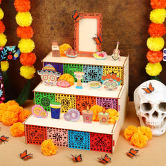 Marigold paper flowers included in the Dia De Muertos Altar Kit