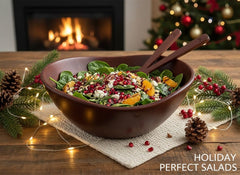 Acacia wood salad bowl set shown with two servers