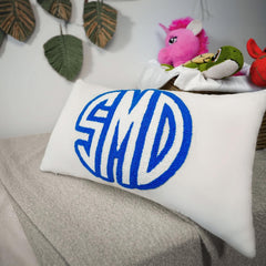 Custom monogram lumbar cushion design on fabric
