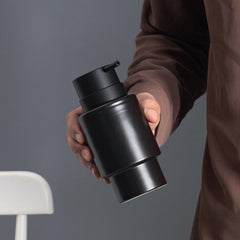 Minimalist black ceramic soap dispenser