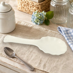 Ceramic spoon rest protecting stovetop and countertops