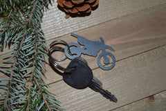 Dirt Bike Keychain dark grey color varies with lighting