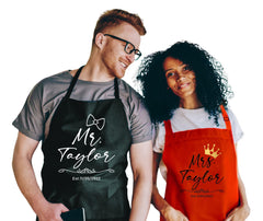 Mr. & Mrs Custom Name Aprons front view with customizable last name and date