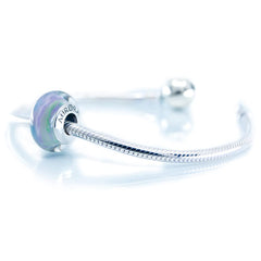 Murano glass and sterling silver charm bead detail
