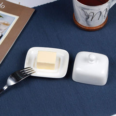 White porcelain domed butter dish with knob lid for serving