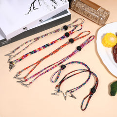 Adjustable locking slide napkin clip for length