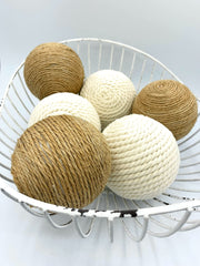 Rope wrapped ball suitable as bowl filler or vase accent