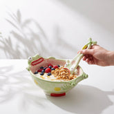 Close up of novelty ceramic big mouth frog bowl