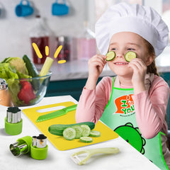 Plastic kids cooking set components including cutting board and peeler