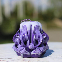 Hand carved purple candle with navy stripes