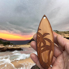 Cedar ornament palm tree surfboard close up