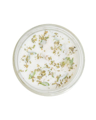 Palo Santo Rue candle packaging with twisted lid