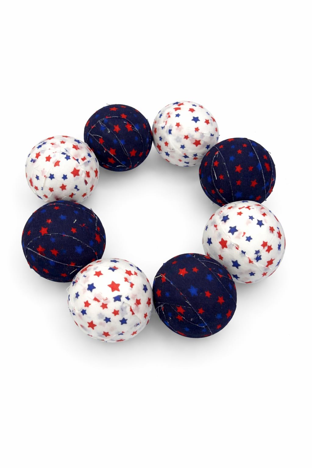 White fabric star ball with red and blue stars for bowls
